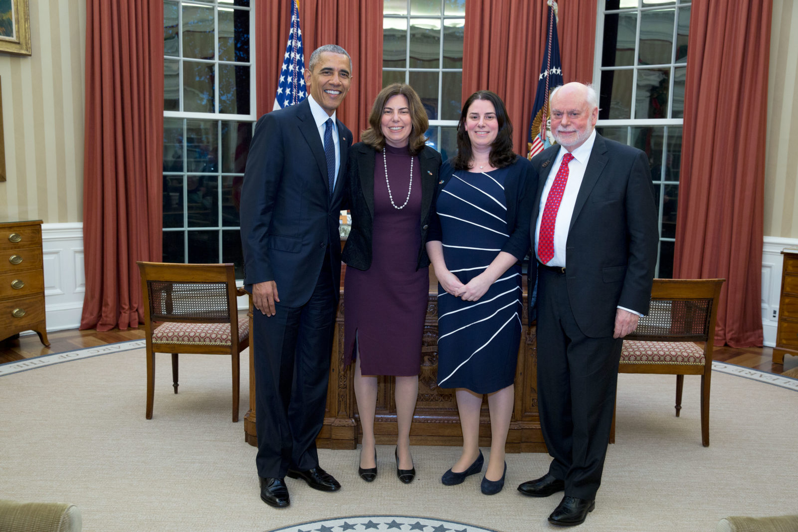 President Barack Obama greets 2016 Nobel Prize winner Fraser Stoddart and his daughters